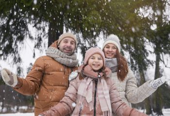 family-playing-with-snow-in-winter-1024x682